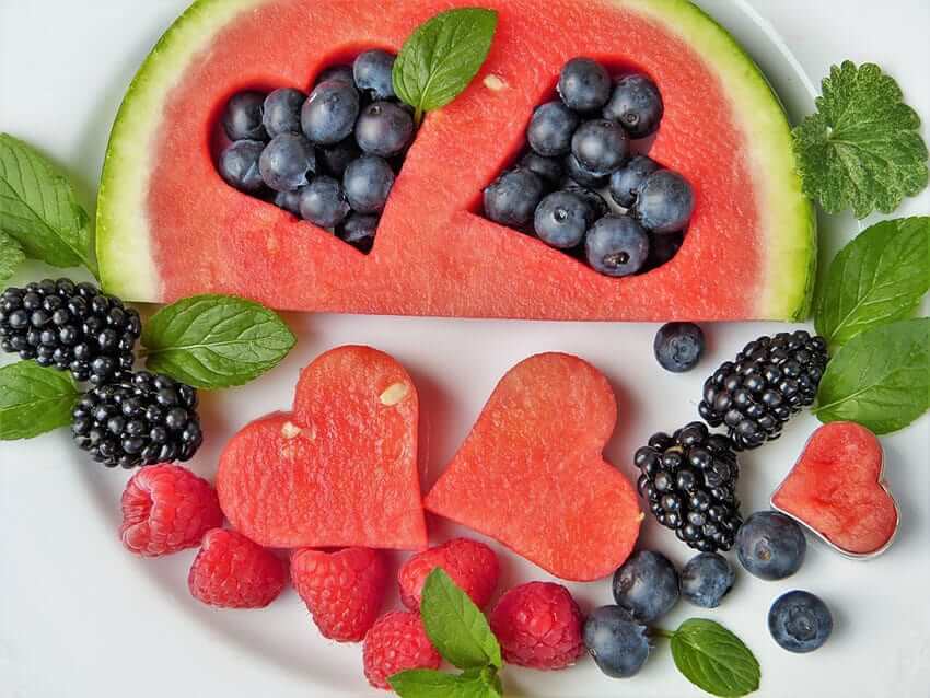 Picture of healthy fruit with heart cut outs