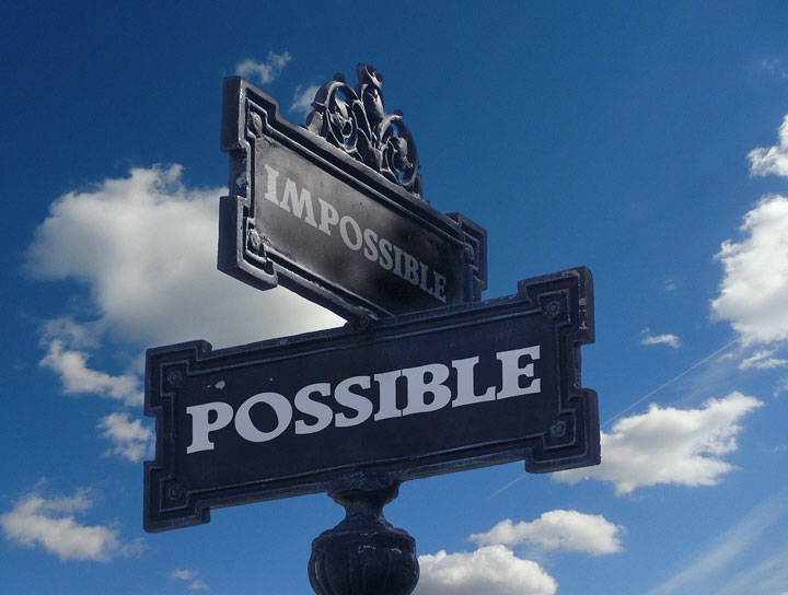 Sign that says Possible and Impossible