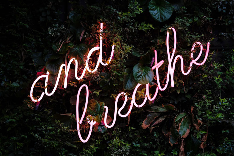 therapeutic breathwork neon sign reminder
