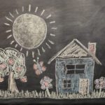 Chalkboard drawing of home and yard